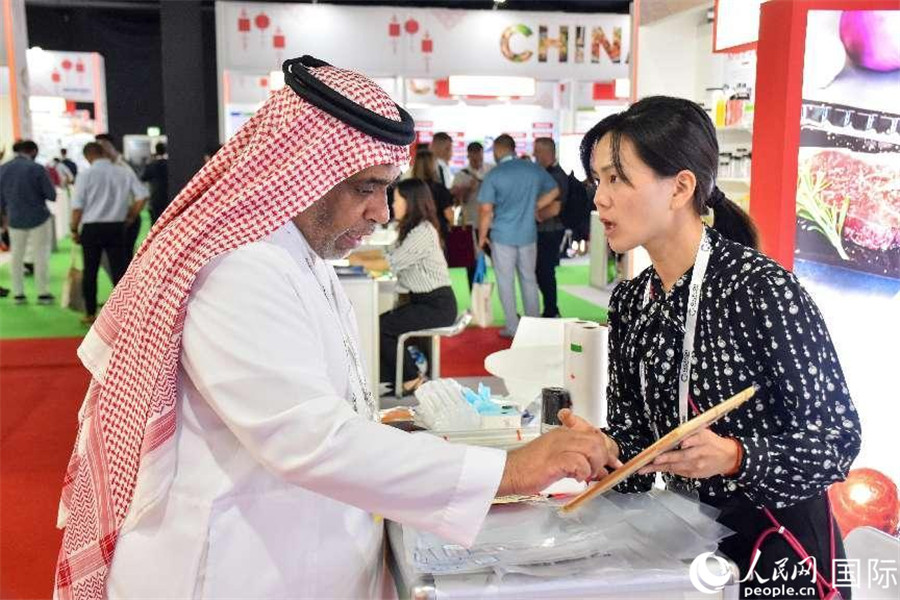 參展商交流。人民網(wǎng)塔里克·易卜拉欣攝