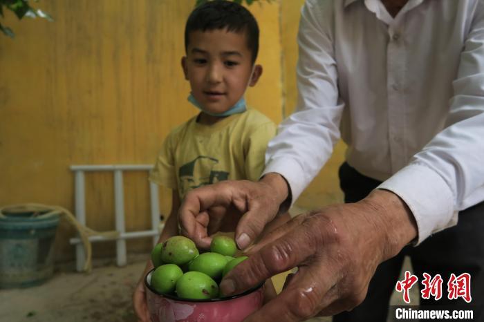 圖為進藏先遣英雄連誓師地原址所在的新疆維吾爾自治區(qū)和田地區(qū)于田縣普魯村現(xiàn)貌?！畛坛?攝