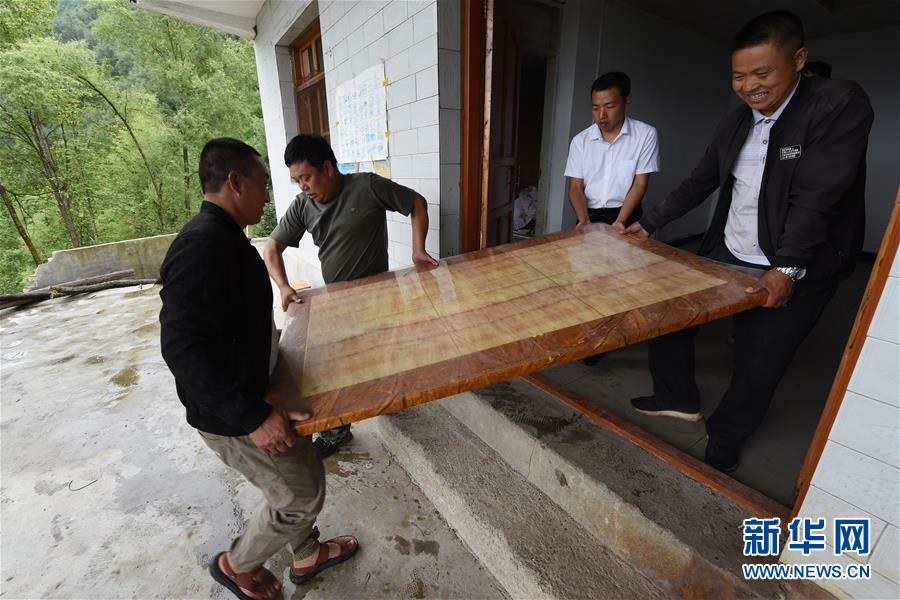 （新華全媒+）（7）千里“挪窩”，踏實開啟新生活