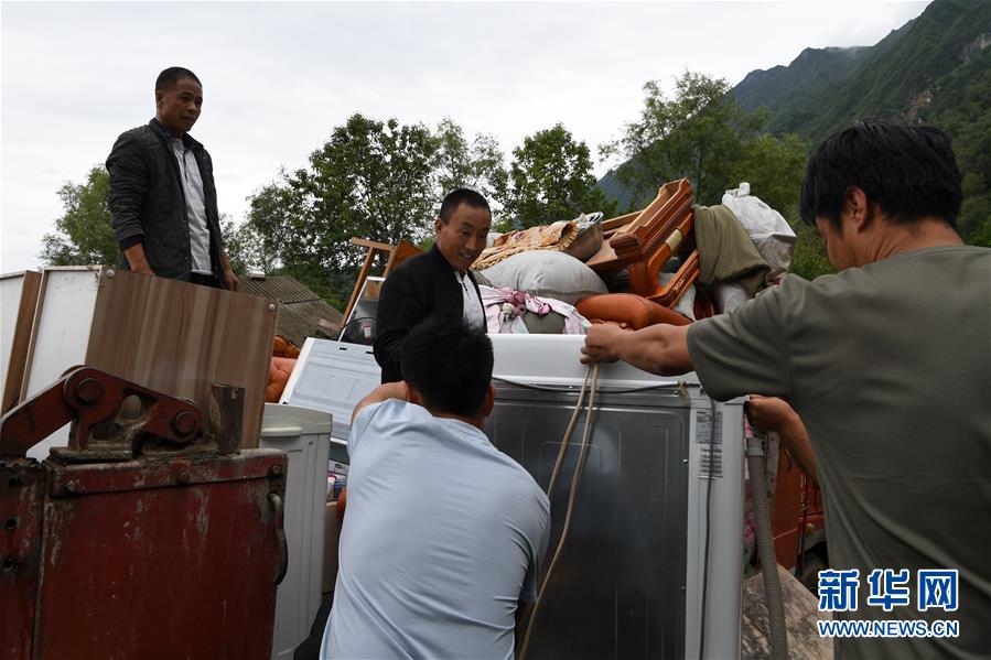 （新華全媒+）（9）千里“挪窩”，踏實開啟新生活